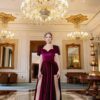 Veloria Dress in deep burgundy velvet with sculpted sleeves and front slits