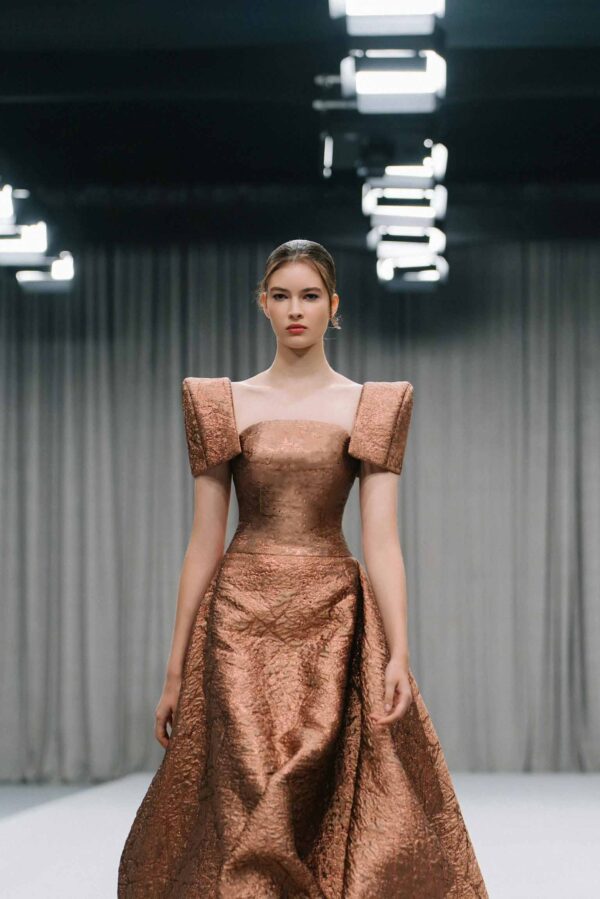 Close-up of Laiton Lumière silk brocade fabric and intricate design