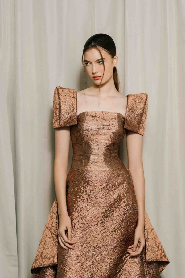 Laiton Lumière dress showing side slit and elegant short sleeves