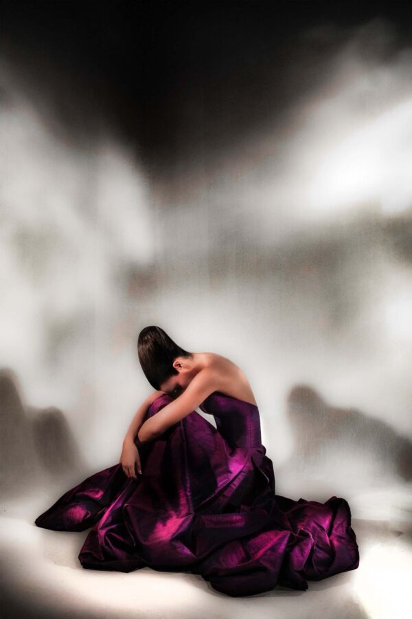 Iridescent violet evening gown with side slits