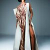 Dusky rose and ivory brocade haute couture gown with elongated side slits and a sculpted open back.