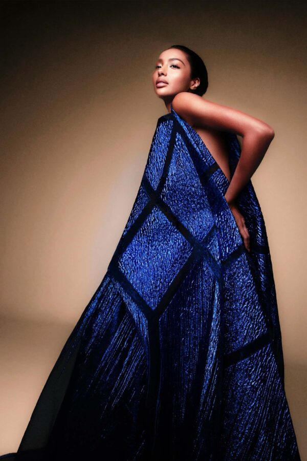 Sculptural panelled haute couture blue gown on mannequin